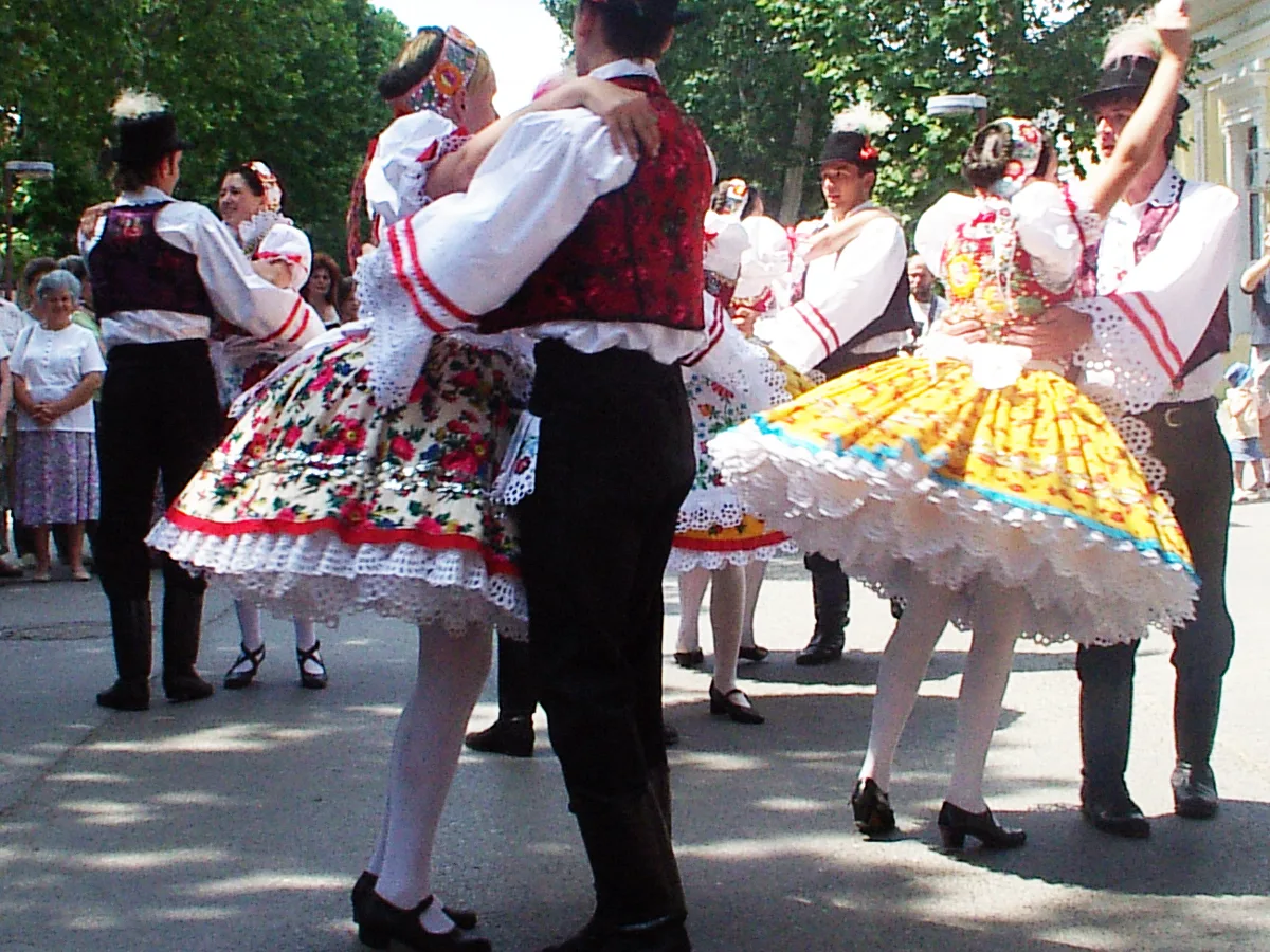 Hungarian folk dancers in traditional costume performing csárdás