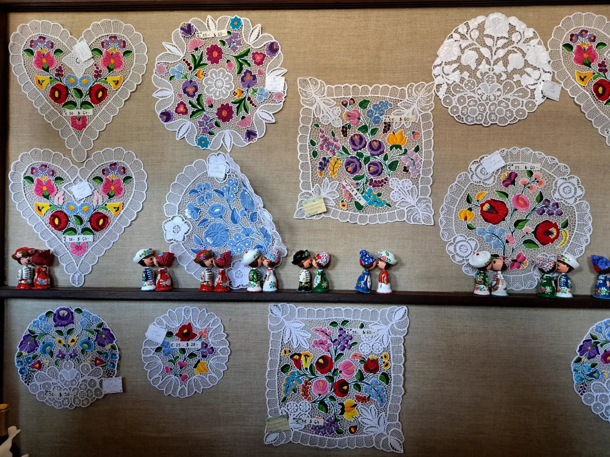 Hand-embroidered Kalocsa-style floral textiles on display